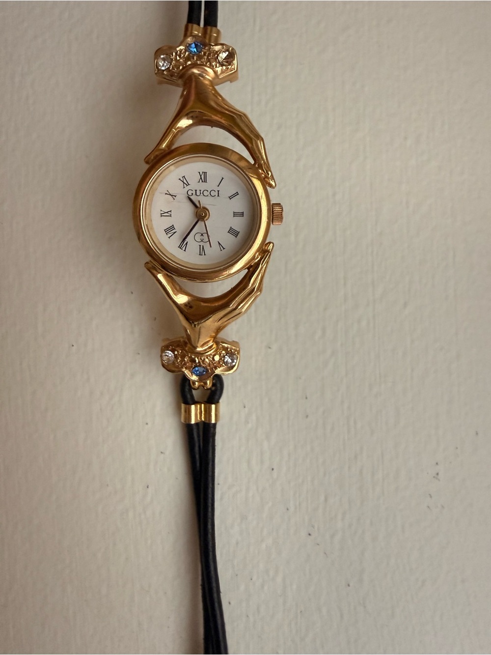 Vintage Gucci Gold Hand-Motif Watch with Black Cord Strap